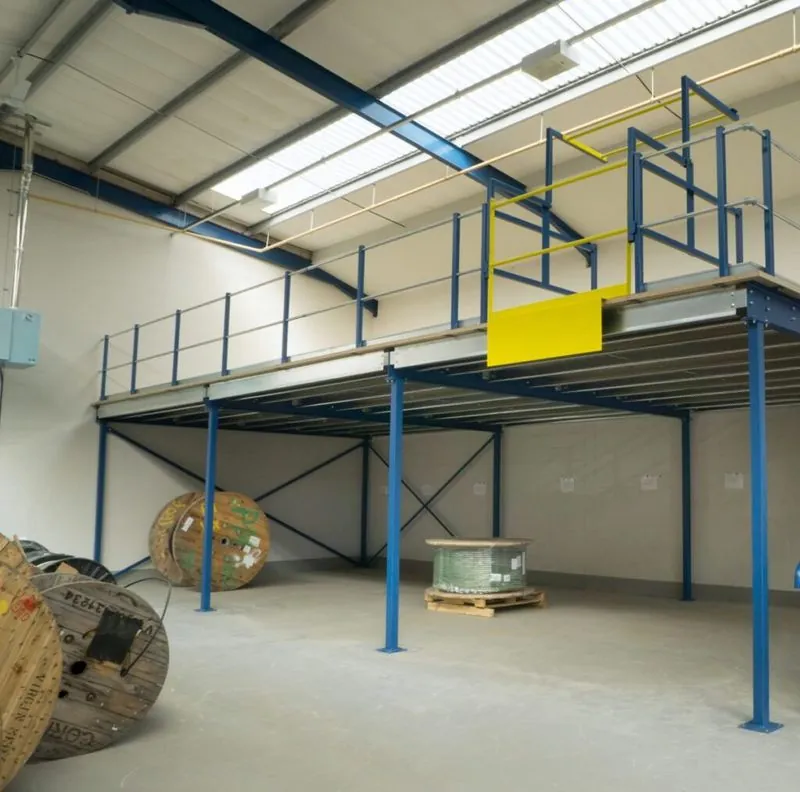 Steel I-beam structure with staircase fabricated in a warehouse