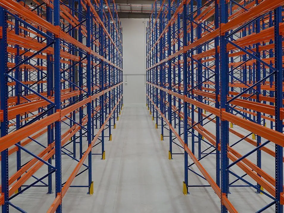 Long aisle of pallet racking in a warehouse