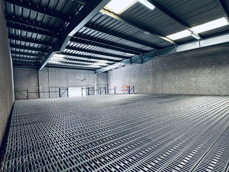 Large warehouse mezzanine floor with GI deck under a steel roof in the UAE